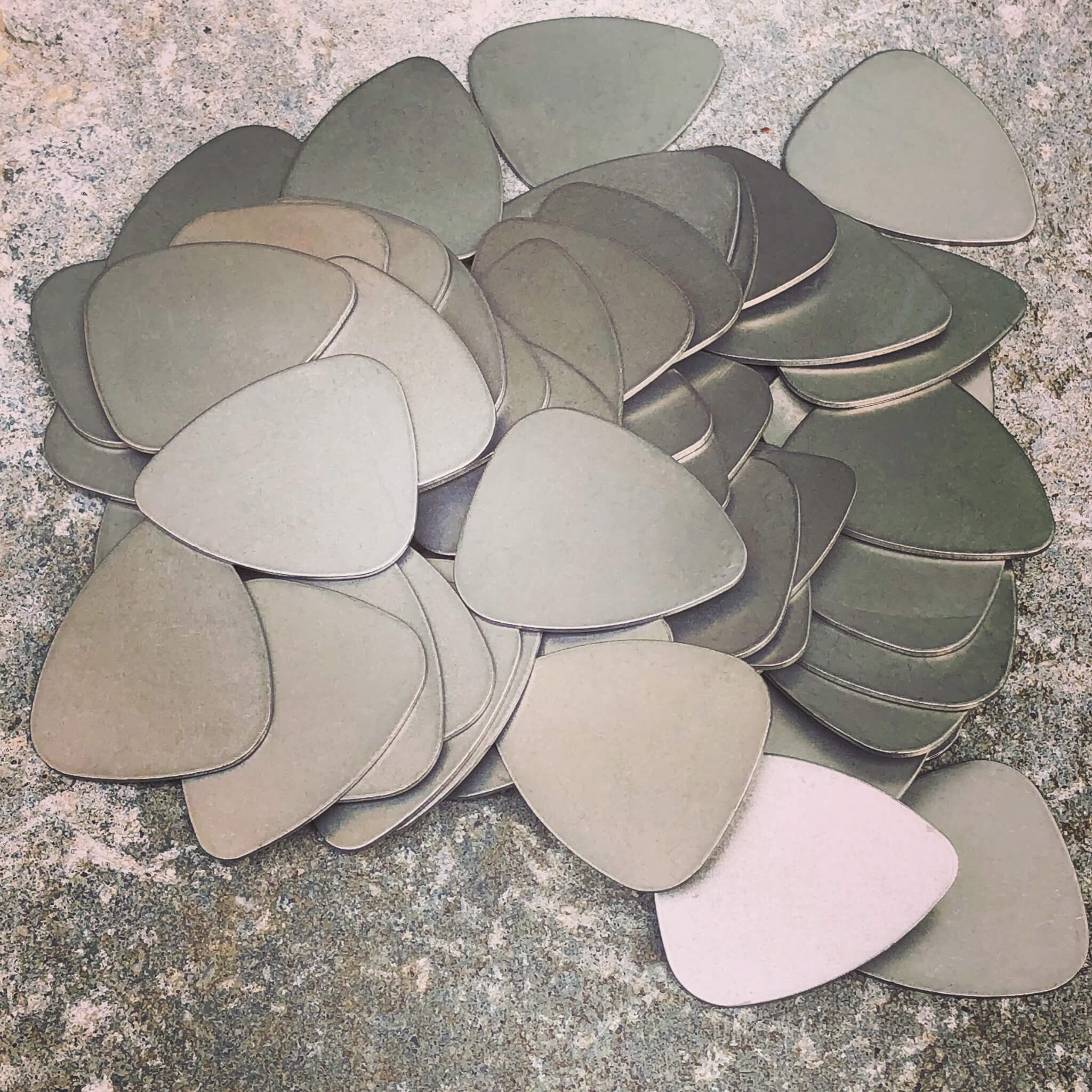 titanium-guitar-picks-stone-wash-finish